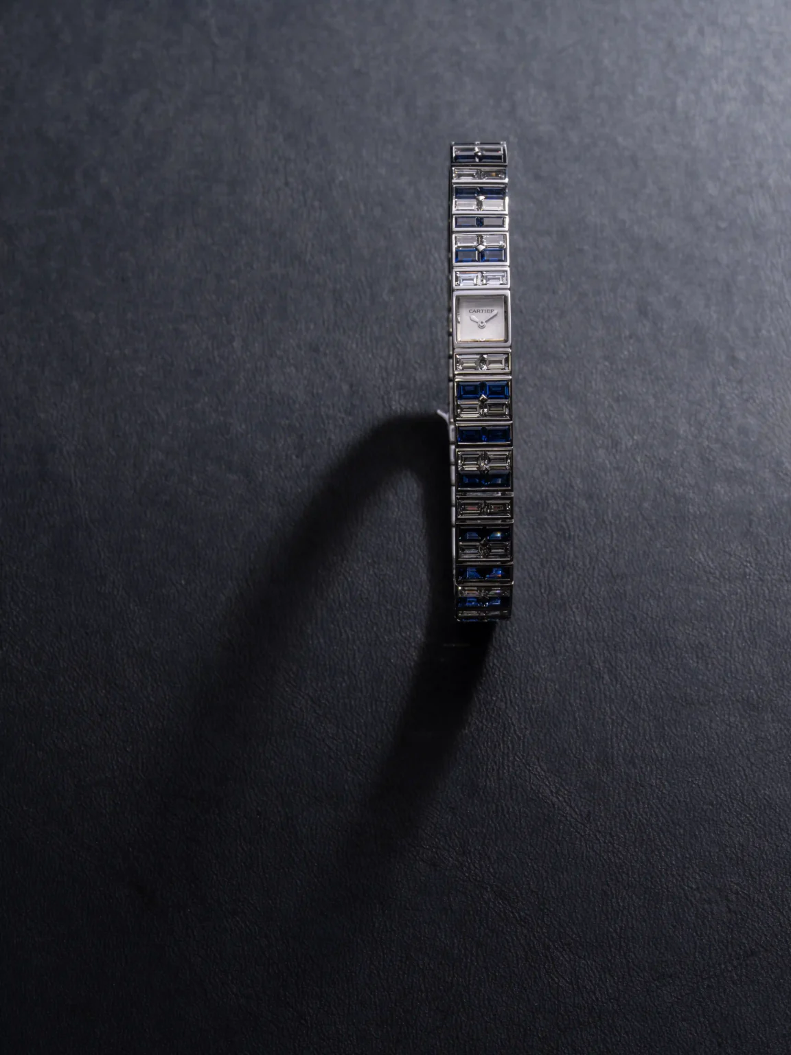 Unique Cartier JLC101 watch with diamond and sapphire baguette-set bracelet